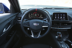 2022-Cadillac-CT4-V-Blackwing-Interior-Level-2-001-Jet-Black-cockpit-steering-wheel-with-carbon-fiber-trim-and-red-stripe-digital-gauge-cluster-center-stack
