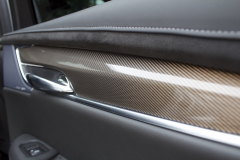 2020-Cadillac-XT6-Premium-Luxury-with-Platinum-Package-Interior-XT6-Drive-003-door-stitching-carbon-fiber-trim