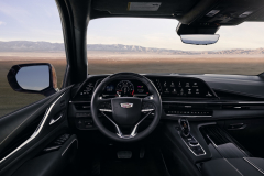 2023-Cadillac-Escalade-V-Press-Photos-Interior-002-cockpit-Super-Cruise-steering-wheel-center-stack-infotainment-screen-shifter