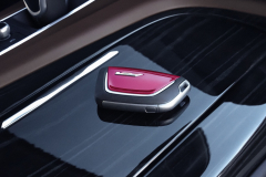 2023-Cadillac-Escalade-V-Press-Photos-Interior-009-key-fob-with-red-insert-on-center-console