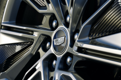 2023-Cadillac-Lyriq-Exterior-035-22-inch-Polished-Gloss-Black-alloy-wheel-with-split-spoke-reverse-rim-pattern-Cadillac-logo-on-center-cap-lug-nuts