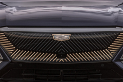 2023-Cadillac-Lyriq-Press-Photos-Media-Drive-Exterior-029-Driving-front-LED-grille-monochromatic-Cadillac-logo