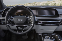 2023-Cadillac-Lyriq-Press-Photos-Media-Drive-Interior-002-cockpit-steering-wheel-curved-display-center-stack-center-console