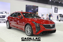 2025-Cadillac-CT5-Premium-Luxury-Red-2023-NAIAS-Live-Photos-Exterior-002-side-front-three-quarters