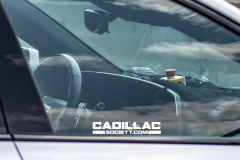 Refreshed-Cadillac-CT5-Prototype-Spy-Shots-June-2023-Interior-002-curved-gauge-cluster-infotainment-screen