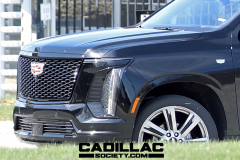 2025-Cadillac-Escalade-Sport-Black-Raven-GBA-Prototype-Spy-Shots-Undisguised-April-2024-Exterior-003-front-three-quarters-headlight-grille