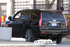 2025-Cadillac-Escalade-Sport-Black-Raven-GBA-Prototype-Spy-Shots-Undisguised-April-2024-Exterior-006-side-rear-three-quarters-tail-lights