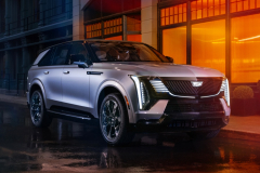 2025-Cadillac-Escalade-IQ-Sport-Reveal-Photos-Exterior-001-front-three-quarters-DRL-daytime-running-lights