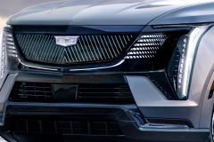 2025-Cadillac-Escalade-IQ-Sport-Reveal-Photos-Exterior-008-front-front-fascia-Cadillac-logo-badge-on-LED-grille-DRL-daytime-running-lights