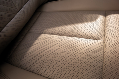 2025-Cadillac-Escalade-IQ-Sport-Reveal-Photos-Interior-008-front-seat-stitching-detail