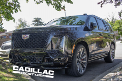 2025-Cadillac-Escalade-V-Prototype-Spy-Shots-No-Camo-May-2024-Black-Raven-GBA-Exterior-001-front-three-quarters-front-fascia-headlights-grille