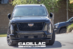 2025-Cadillac-Escalade-V-Prototype-Spy-Shots-No-Camo-May-2024-Black-Raven-GBA-Exterior-006-front-mirrors-folded-in