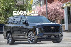 2025-Cadillac-Escalade-V-Prototype-Spy-Shots-No-Camo-May-2024-Black-Raven-GBA-Exterior-010-side-front-three-quarters-mirrors-folded-in