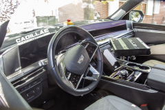 2025-Cadillac-Escalade-V-Prototype-Spy-Shots-No-Camo-May-2024-Interior-002-cockpit-dash-steering-wheel-digital-instrument-panel-gauge-cluster-screen
