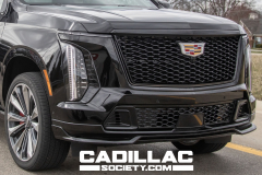 2025-Cadillac-Escalade-V-Prototype-Spy-Shots-Undisguised-April-2024-Exterior-002-front-three-quarters-front-fascia-grille-headlights
