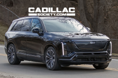 2026-Cadillac-Vistiq-Black-Real-World-Photos-March-2024-Exterior-002-side-front-three-quarters-front-fascia-DRL-daytime-running-lights
