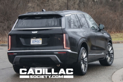 2026-Cadillac-Vistiq-Black-Real-World-Photos-March-2024-Exterior-008-rear-three-quarters-tail-lights