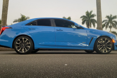 2022-Cadillac-CT4-V-Blackwing-GMA-Garage-Electric-Blue-Exterior-019-side-low-angle