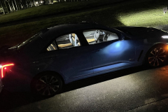 2022-Cadillac-CT4-V-Blackwing-GMA-Garage-Electric-Blue-Exterior-029-side-puddle-light-cabin-lights-at-night