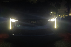 2022-Cadillac-CT4-V-Blackwing-GMA-Garage-Electric-Blue-Exterior-041-Daytime-Running-Lamps-DRL-and-Headlamps-at-night