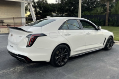 2022-Cadillac-CT4-V-Blackwing-Summit-White-Carbon-Fiber-Package-1-and-2-Exterior-005-rear-three-quarters