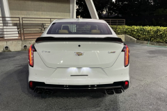 2022-Cadillac-CT4-V-Blackwing-Summit-White-Carbon-Fiber-Package-1-and-2-Exterior-008-rear-medium-angle
