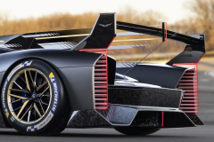Cadillac-Project-GTP-Hypercar-Press-Photos-Exterior-012-rear-three-quarters-rear-end-detail-spoiler-wing-tail-lights-diffuser-rear-wheel-and-tire