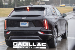 2025-Cadillac-Optiq-Black-Real-World-Photos-March-2024-Exterior-008-rear-CHMSL-liftgate-tail-lights