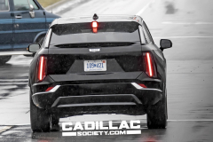 2025-Cadillac-Optiq-Black-Real-World-Photos-March-2024-Exterior-009-rear-CHMSL-liftgate-tail-lights