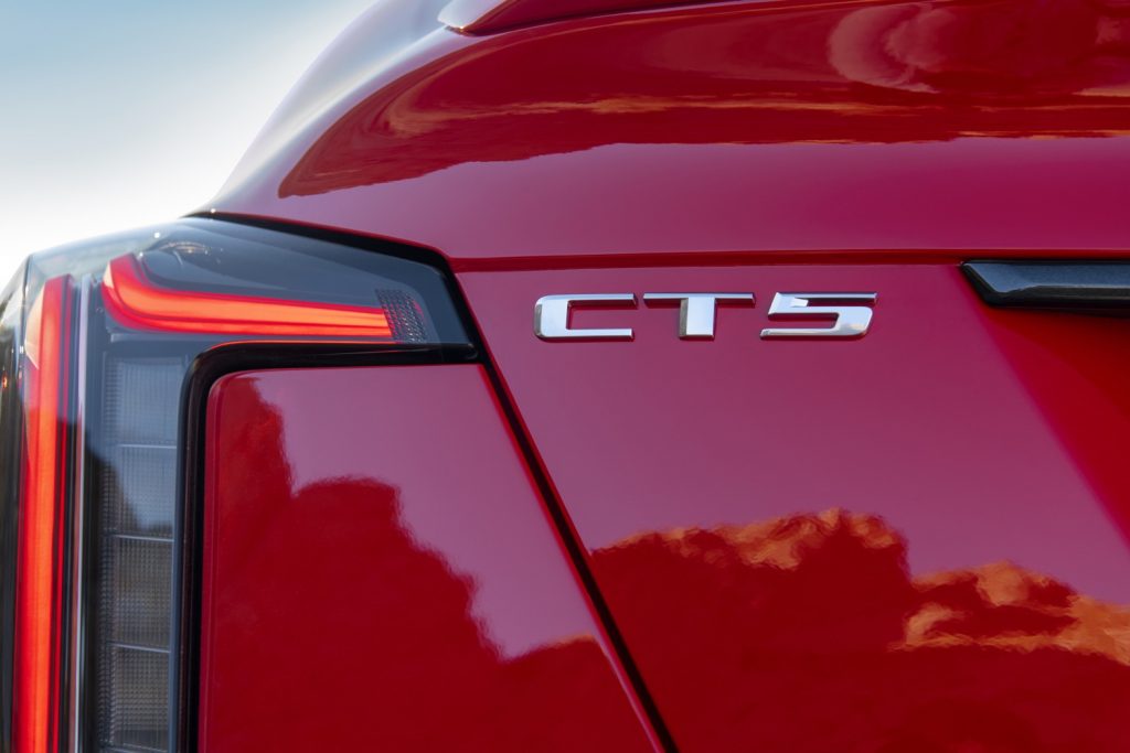 Neutral-density tail lamps with gray-tinted transparent outer lens on CT5-V