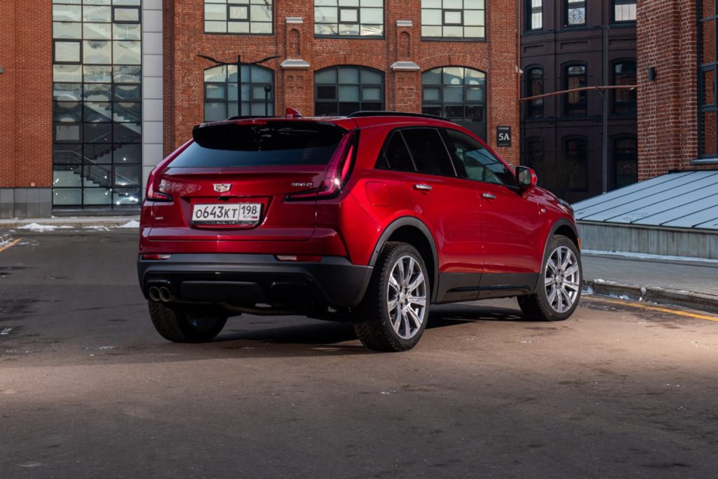 Current, pre-refresh Cadillac XT4 (rear three quarters view).