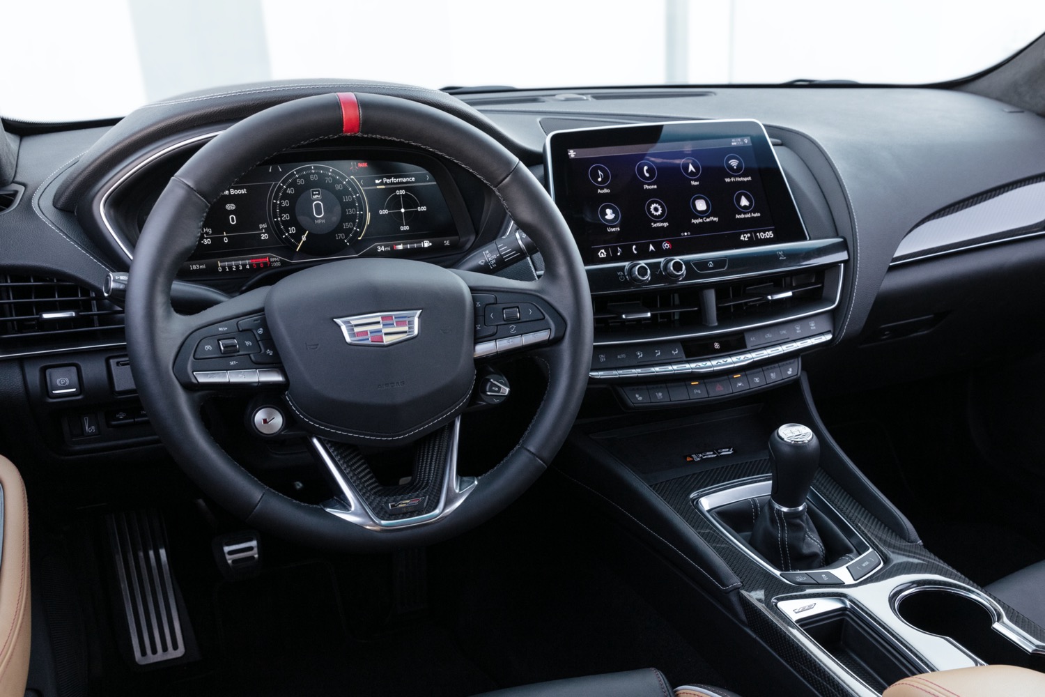 2022 Cadillac CT5 V Blackwing Interior Level 3 009 Natural Tan Cockpit Steering Wheel With Carbon Fiber Accents And Red Stripe Digital Gauge Cluster Center Stack Manual Transmission 