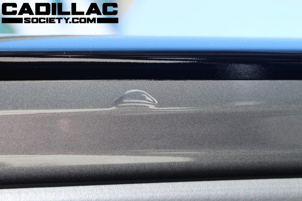 A photo of the roof rack clamp point on the 2023 Cadillac Lyriq.